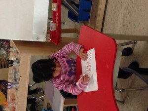 copying the letter . "p" and it's picture from our Jolly Phonics poster
