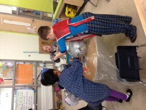 Working on some more paper mache planets; our solar system is almost complete!