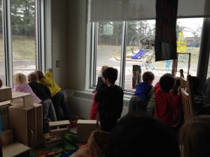 Watching the first snowfall! Here's some of the things we said: "YAY! That means it's almost Christmas!" "It's actually real snow, you know." 