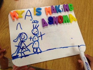 I drew a picture of me making a snowman and then made a sentence to explain it.