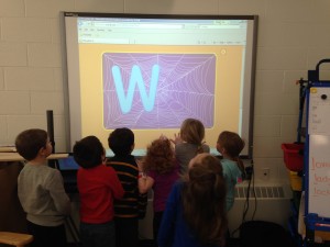 Playing with the smart board. 