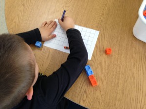 making a math train and copying my pattern on to the grid