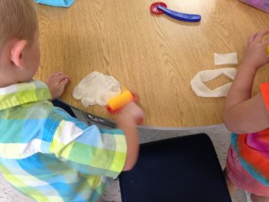 Fine motor/Social- Exploring some of our play dough tools 