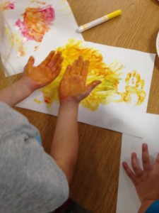 Creating a "fall colour" by mixing colours - this was part of our first inquiry