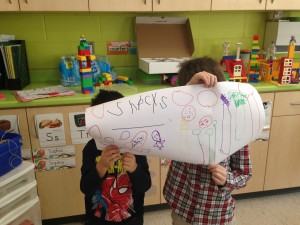 teamwork creating our snack sign