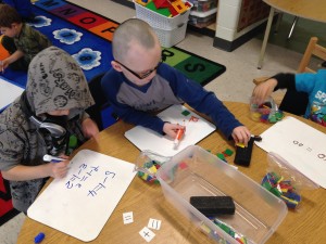 lots of math happening at this table, a great example of how each child can use the materials in their own way to enhance their learning 